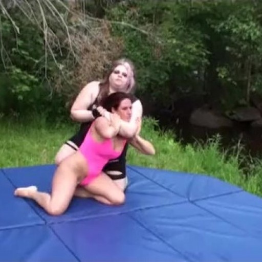 Female wrestler dominated